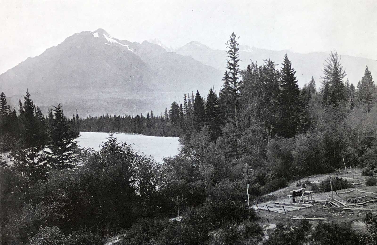 Tête Jaune Cache, showing old camping ground of fur trappers. In the distance is Mica Mountain. 1910