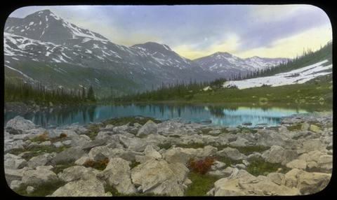 Committee’s Punch-bowl at the Source of the Whirlpool River. Hand-coloured lantern slide by Mary T.S. Schäffer. Photo taken in 1908