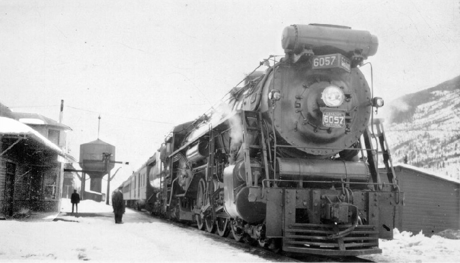 Water tower and locomotive at Red Pass station. Canadian National steam engine 6057 (manufactured by Montreal Locomotive Works in 1930 and scrapped in 1960, 4-8-2, U-1-e).