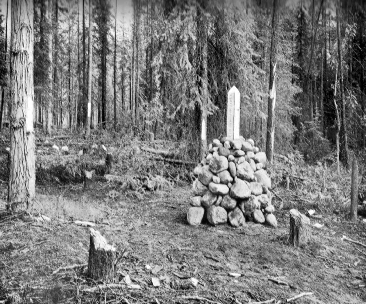 Monument placed at summit of Yellowhead Pass.
Photo: A. 0. Wheeler, 1911