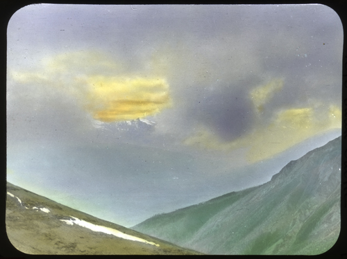 Mt. Robson from mountain near Tête Jaune Cache. Photo: Mary Schäffer, 1908 
(hand coloured lantern slide)