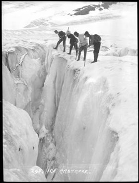 On Robson Glacier. Dr. P.M. Campbell, C. Greenway, Helena Walcott, Preston L. Tait. Mount Robson ACC Camp. Photo: Byron Harmon, 1913